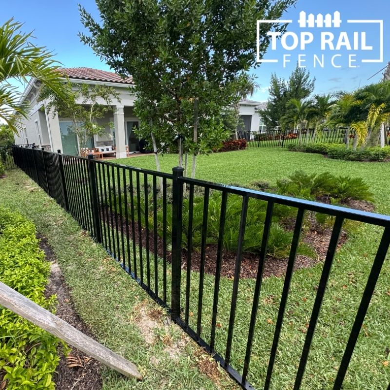 aluminum fence installed by top rail fence