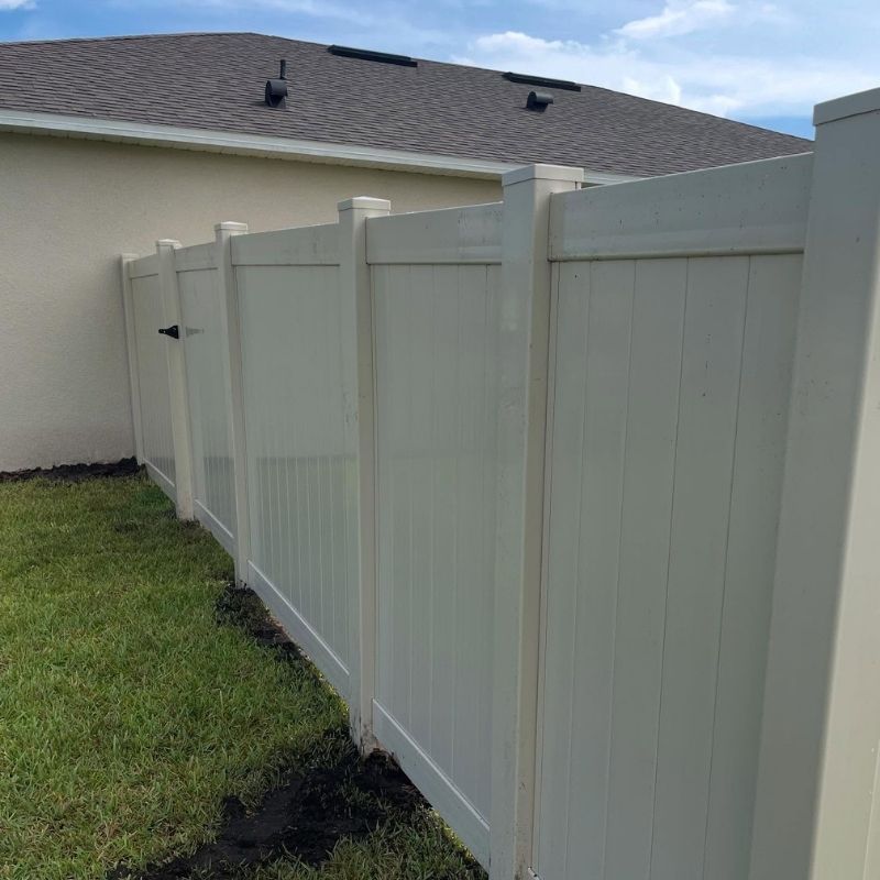 vinyl fence installed by top rail fence