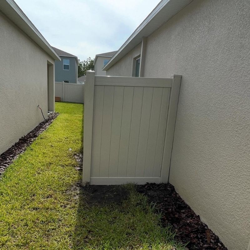vinyl fence installed by top rail fence