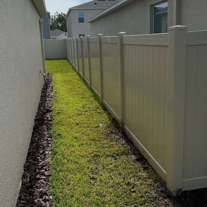 vinyl fence installed by top rail fence