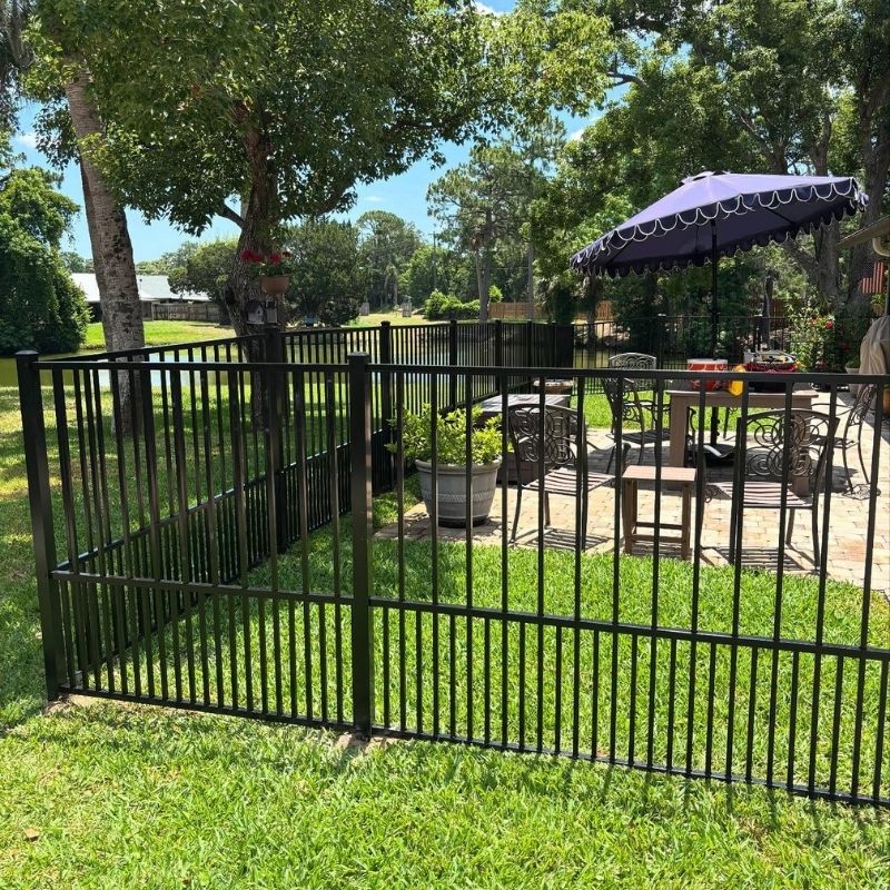 aluminum fence installed by top rail fence