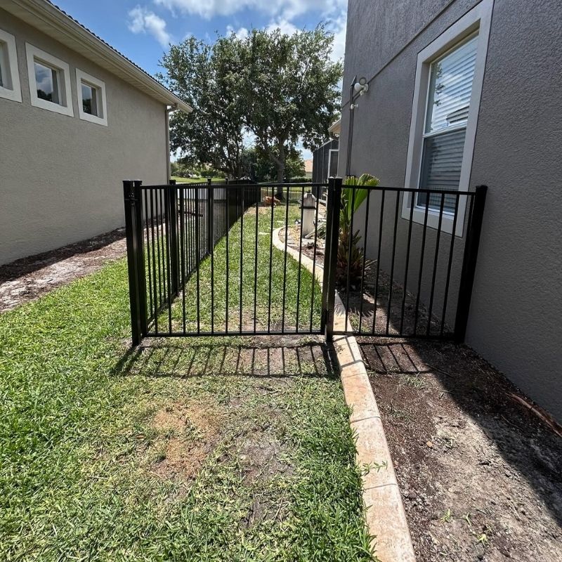 aluminum fence installed by top rail fence