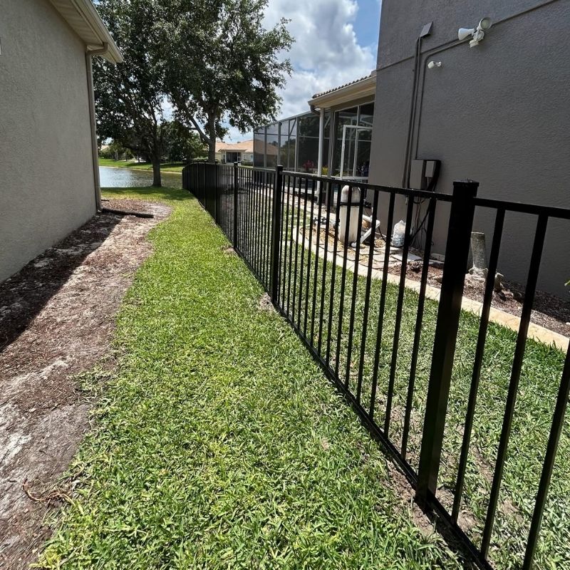 aluminum fence installed by top rail fence