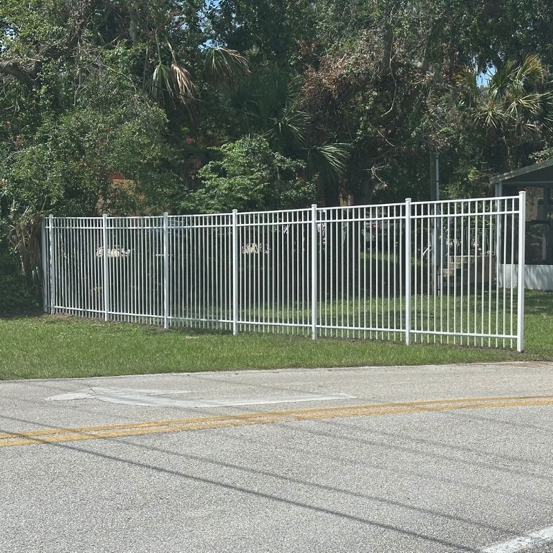 aluminum fence installed by top rail fence