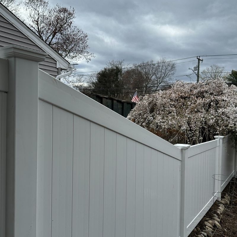 white vinyl privacy fence installed by Top Rail Fence