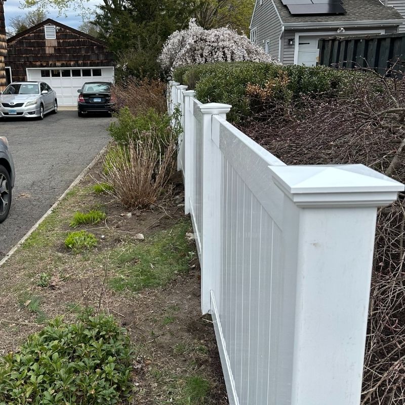 white vinyl privacy fence installed by Top Rail Fence