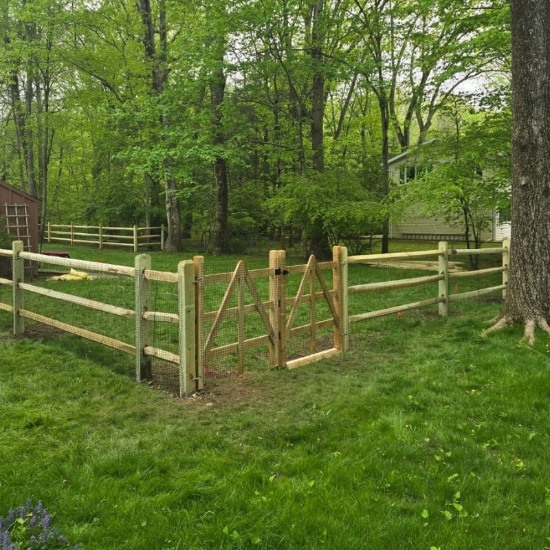Split Rail Fence with Mesh Wire installed by Top Rail Fence