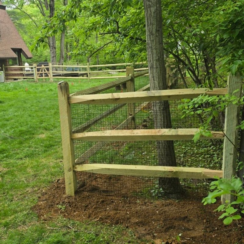 Split Rail Fence with Mesh Wire installed by Top Rail Fence