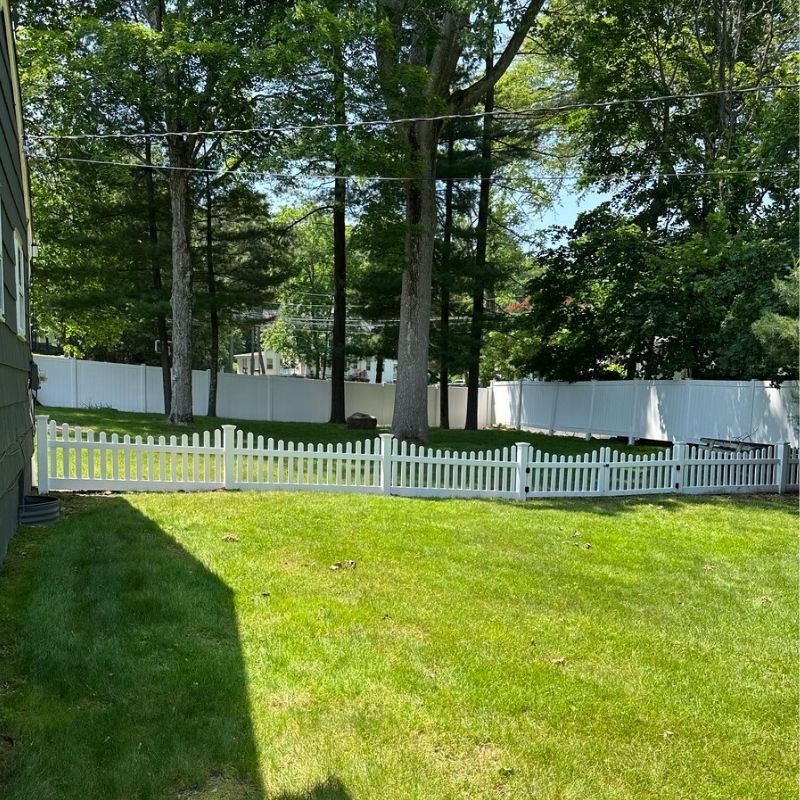 white vinyl fence installed by Top Rail Fence