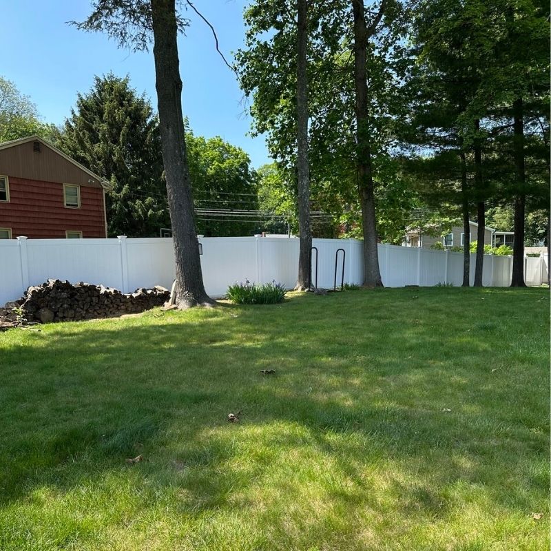 white vinyl fence installed by Top Rail Fence