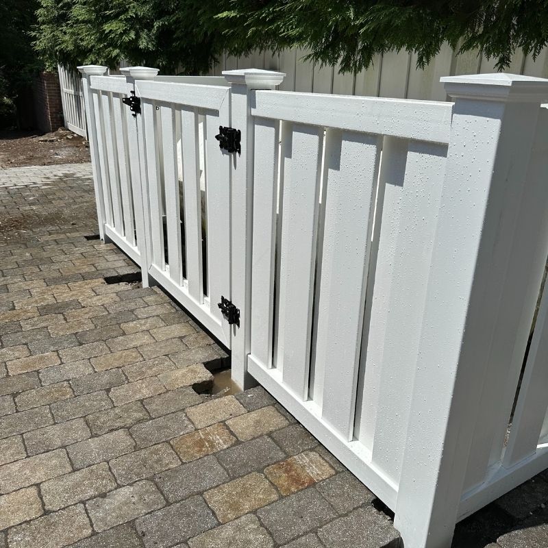 shadowbox vinyl fence installed by top rail fence