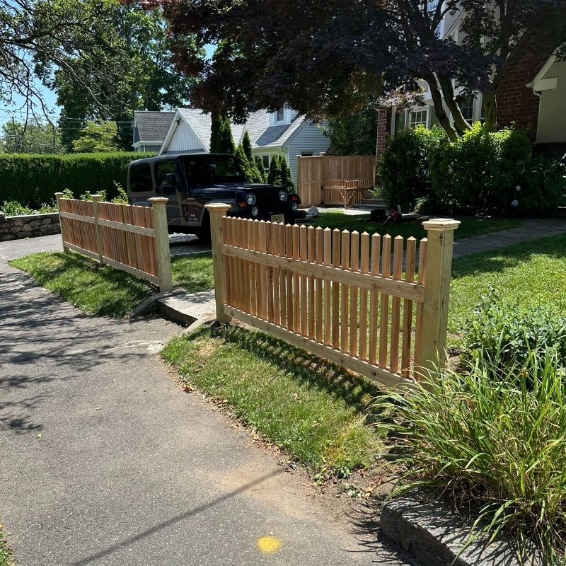 picket fence installed by top rail fence