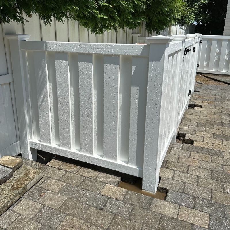 shadowbox vinyl fence installed by top rail fence