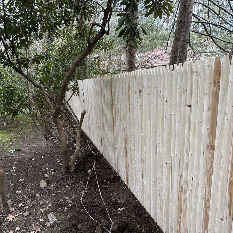 Spruce wood stockade fence