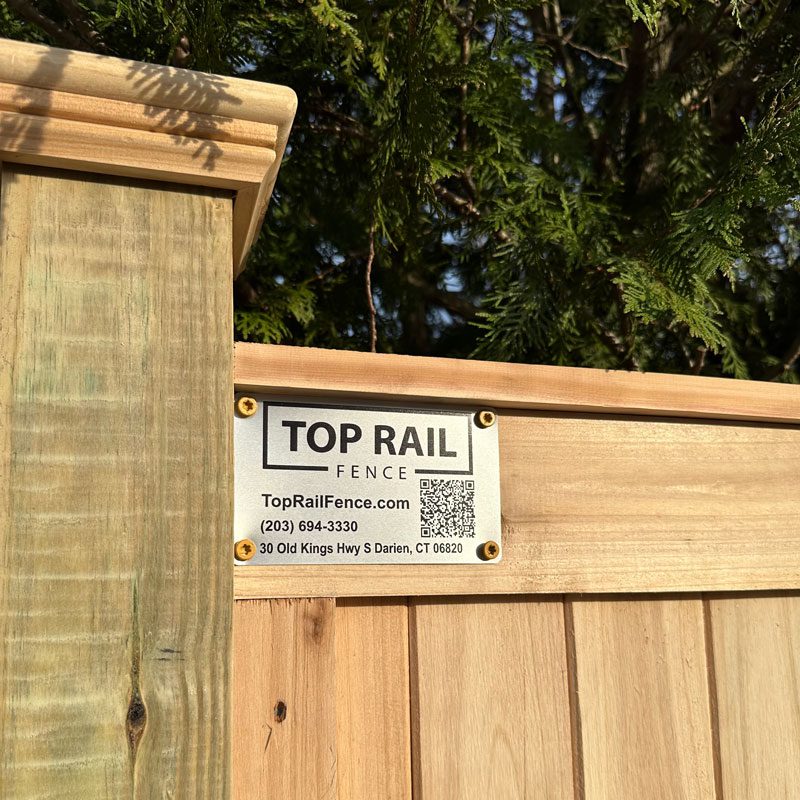 cedar cap and trim fence installation