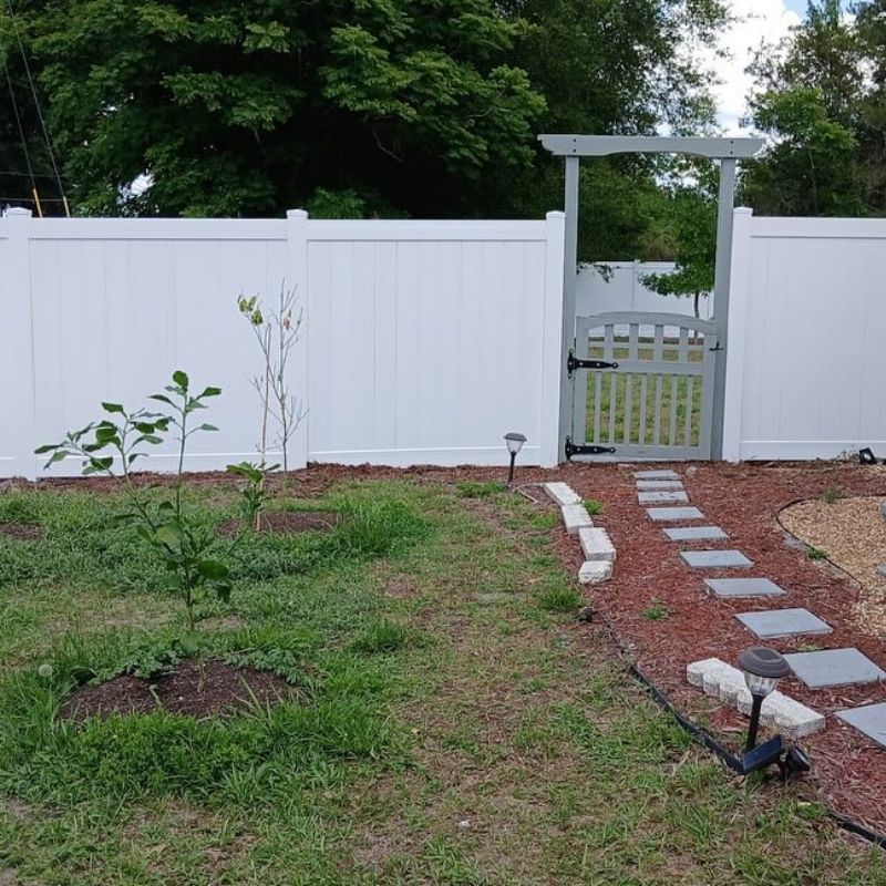 vinyl fence installed by top rail fence