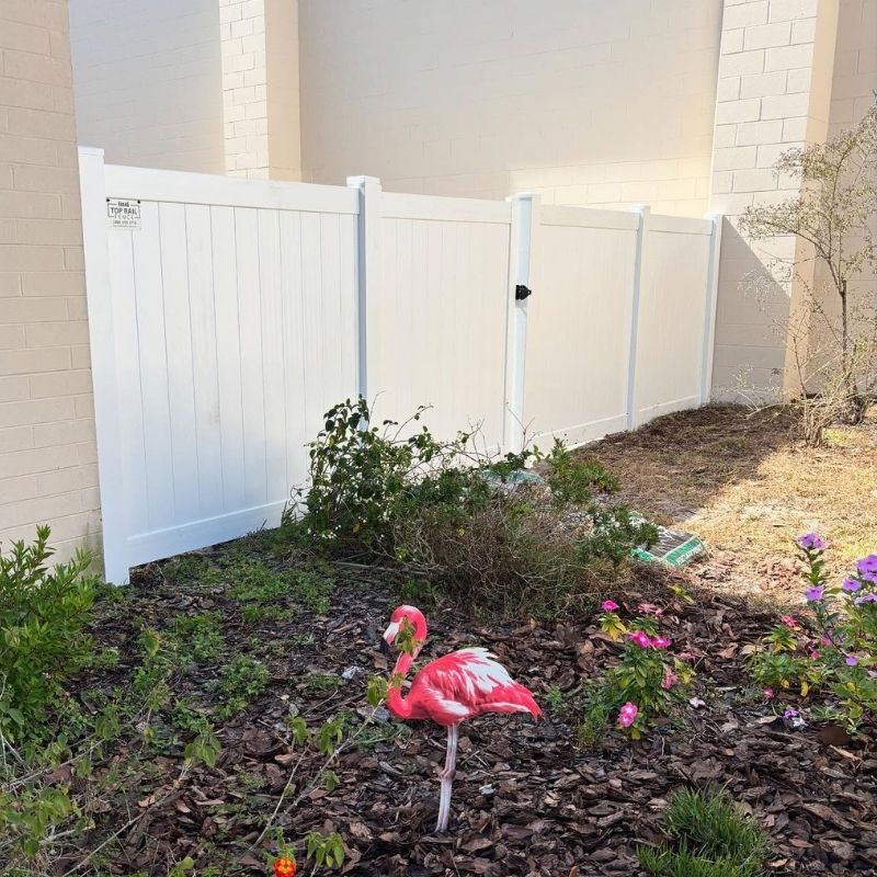vinyl fence installed by top rail fence
