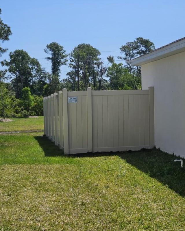 White vinyl Top Rail Fence in Dakota Beach