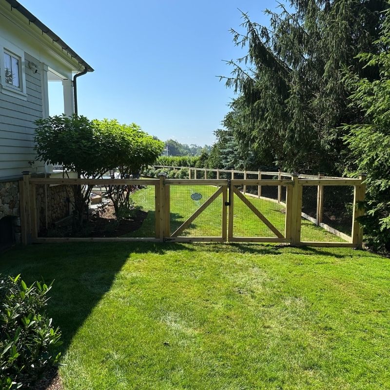 cedar fence installed by top rail fence