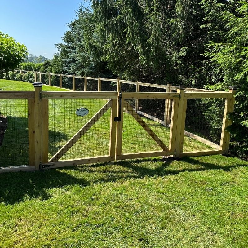 cedar fence installed by top rail fence