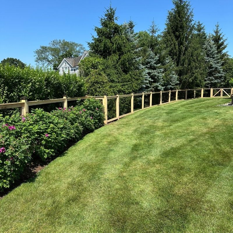 cedar fence installed by top rail fence