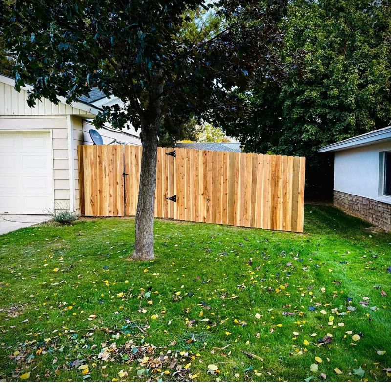 New wooden fence front yard view