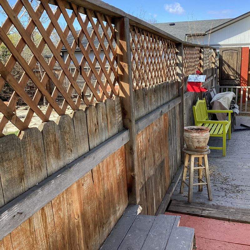 Old wooden fence in backyard