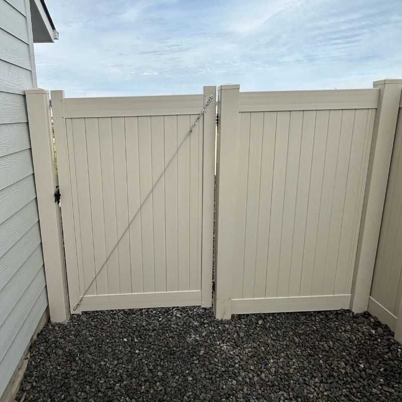 Vinyl gate installed by Top Rail Fence