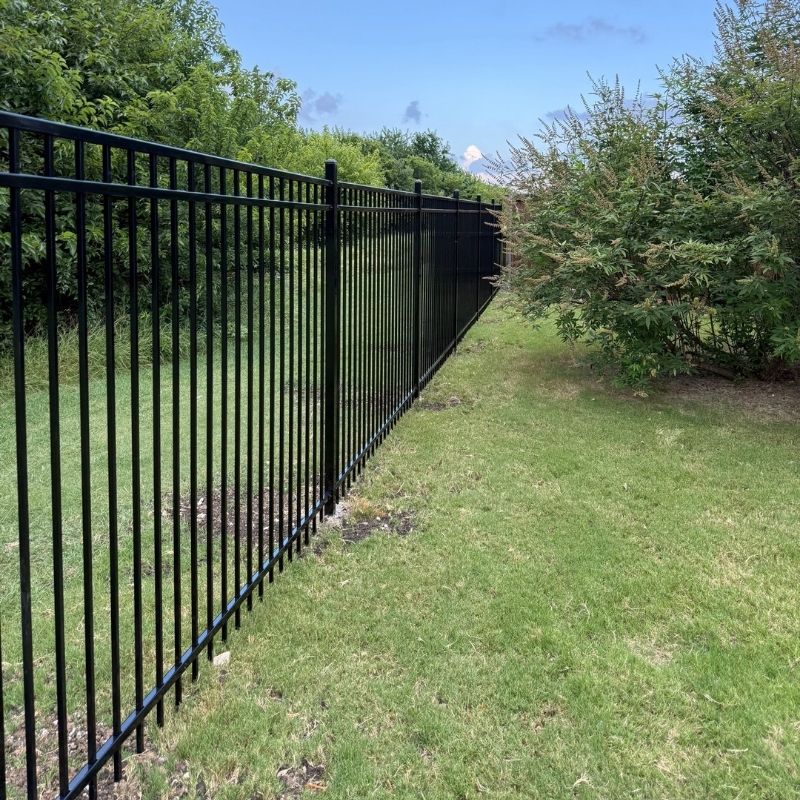 metal fence installed by top rail fence
