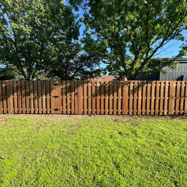 Backyard with Wooden Top Rail Fence in North Texas