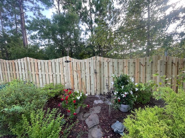 Scalloped shadow box fence