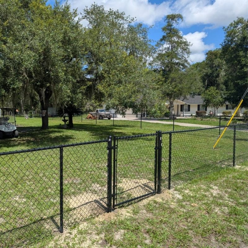 chain link fence installed by top rail fence