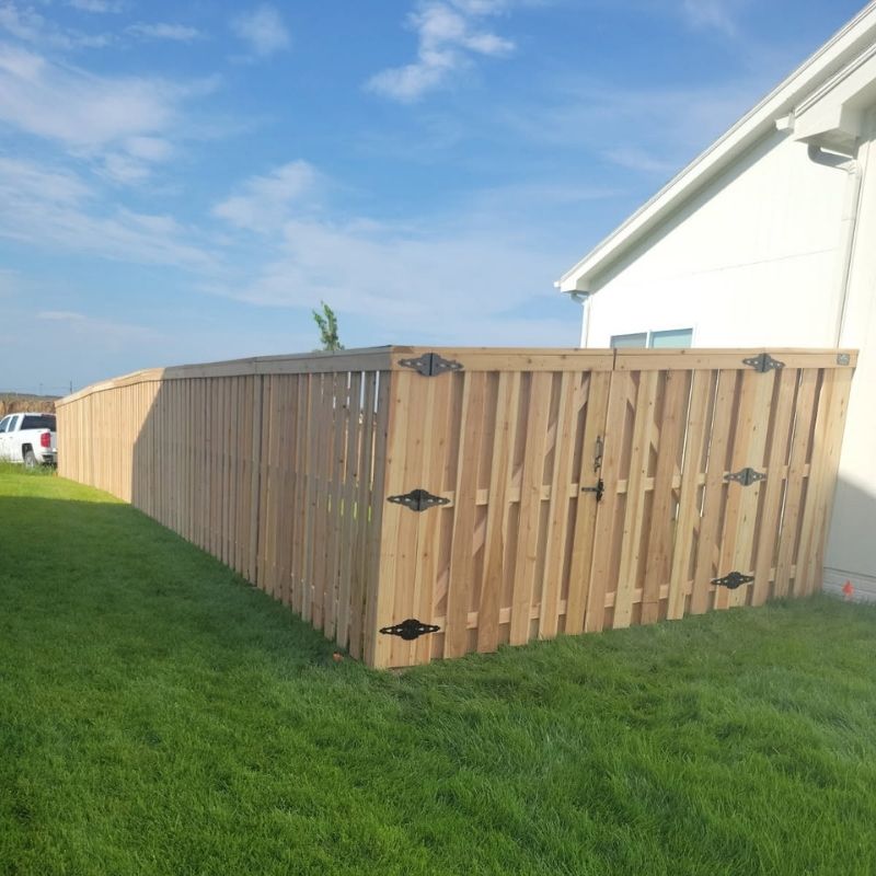 shadowbox fence installed by top rail fence