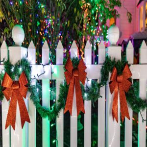 bows garland fence lighting holidays