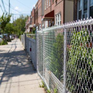 chain link fence sidewalk urban