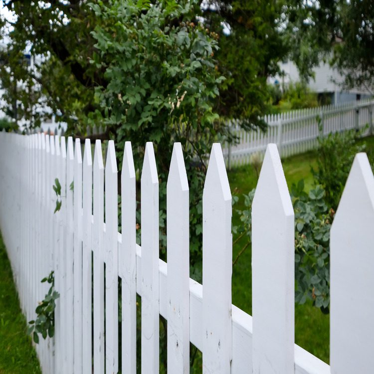 painted picket wood fence closeup