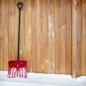 snow shovel wood fence winter maintenance