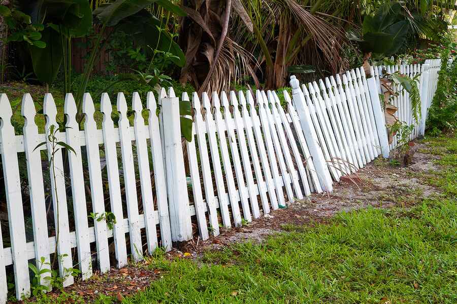 image of picket fence that needs repair