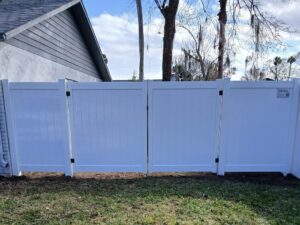 vinyl fence in front of home