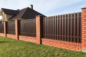 Mixed Material Aluminum and Brick Fence