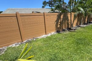 Dark tan vinyl horizontal fence