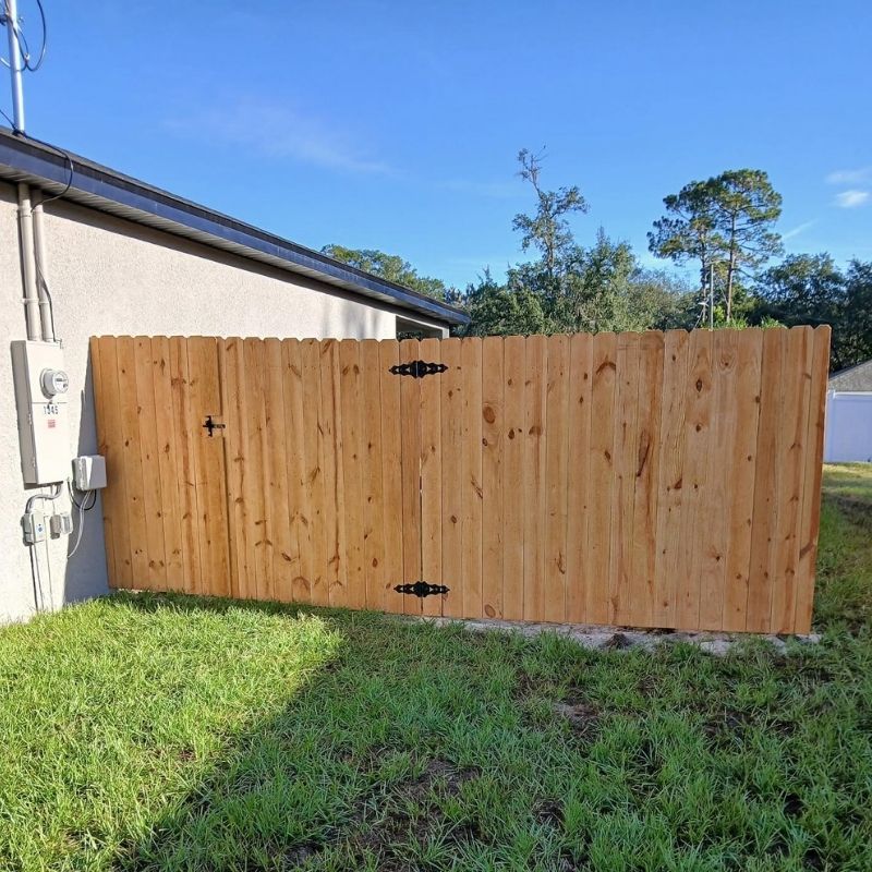 wood stockade fence installed by Top Rail Fence