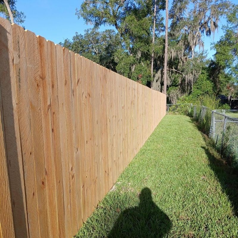 wood stockade fence installed by Top Rail Fence