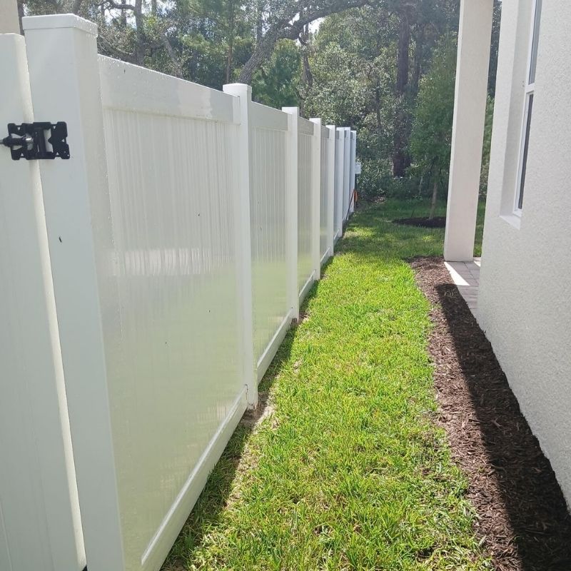 Vinyl privacy fence installed by Top Rail Fence