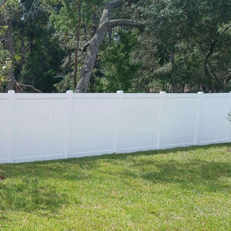 Vinyl privacy fence installed by Top Rail Fence