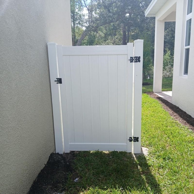 Vinyl privacy fence installed by Top Rail Fence