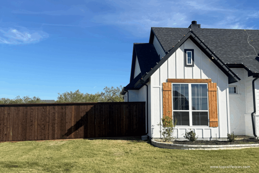 A nice home with a stained cedar fence