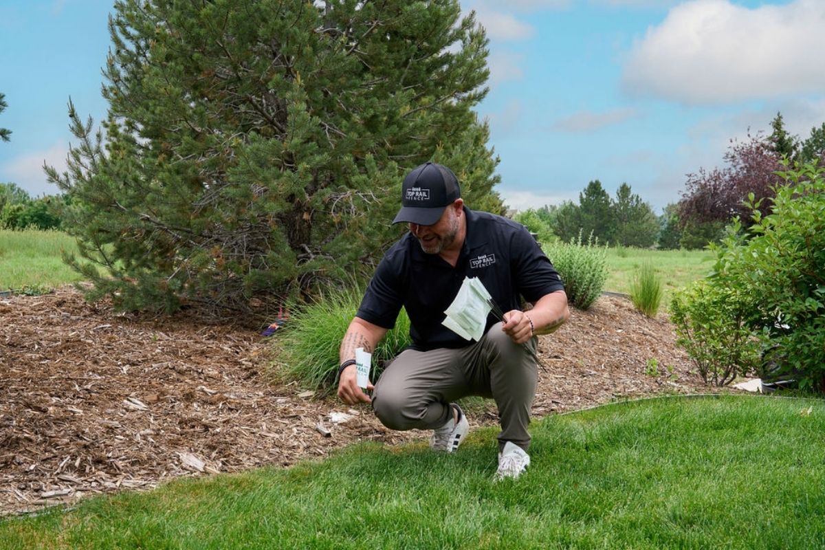 Top Rail Fence professional marking where a fence will be installed
